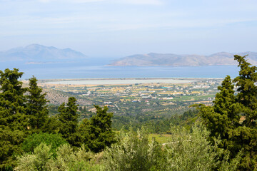 Fototapeta na wymiar View of the island of Kos from above. Salt lake and sea in the background