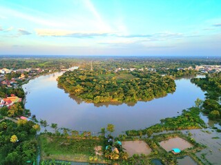 aerial photography  of river bends and riverside forests.