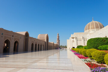 Outer courtyard of the great mosque of the Sultan of Qaboos consisting of colourful domed gardens...