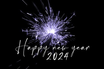 Happy new year 2024 purple sparkler new years eve countdown. Luxury entertainment celebration turn of the year party time. Premium nightlife visual with glowing light sparks on dark background - 661931609