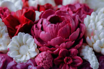 Close up shot berry marshmallow flowers, buds. Wow Zephyr. Handmade sweets.