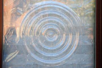 Glass window pane with ripple pattern 