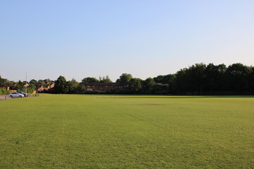 Outdoor public playing fields taken at sunset on a hot summers day