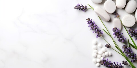 Obraz na płótnie Canvas A delicate flat lay featuring lavender flowers and natural cosmetics, elegantly displayed on a sophisticated marble background, offering a soothing visual experience and empty space for versatile use.