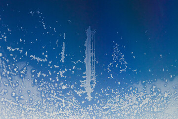 Frozen frost on the window glass.