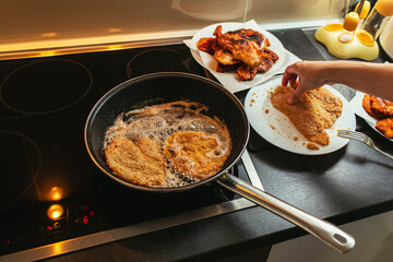Close-up of making schnitzel