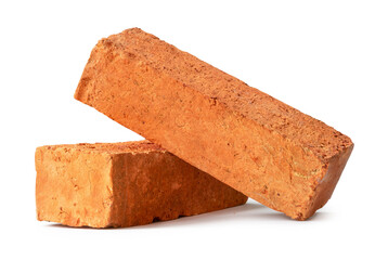 Cracked old red or orange bricks in stack isolated on white background with clipping path