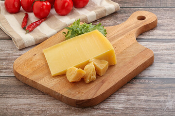Parmesan hard cheese with small pieces