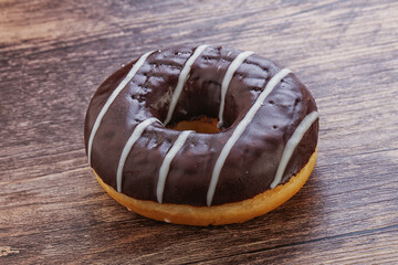 Glazed sweet tasty chocolate donut
