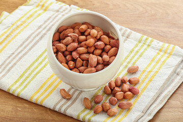 Raw peanut heap in the bowl