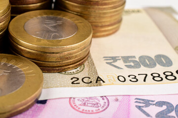 Closeup of indian currency coin and banknote