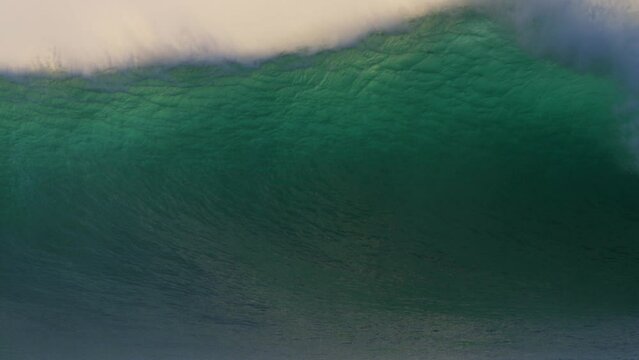 huge stormy wave crashing in the ocean close up