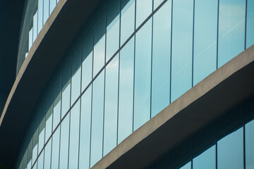 Curtain walling, integrated with solar window films, enhances the energy efficiency of the building...