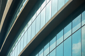 Curtain walling, integrated with solar window films, enhances the energy efficiency of the building...