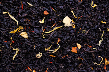 black tea leaves with petals and fruits