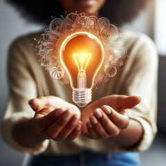 New bright idea concept with human palms holding illuminated lightbulb - obrazy, fototapety, plakaty