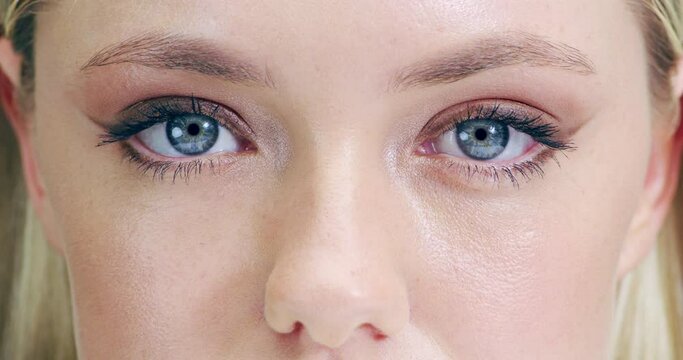 Blue, eyes and vision, beauty with woman and face, contact lenses and eye care with cosmetics closeup. Makeup, microblading and eyebrow with lashes, blink and skin, eyesight and optometry portrait