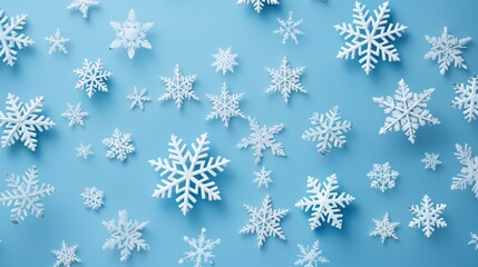 white snowflakes on light blue background