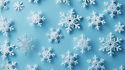 white snowflakes on light blue background