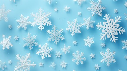 white snowflakes on light blue background