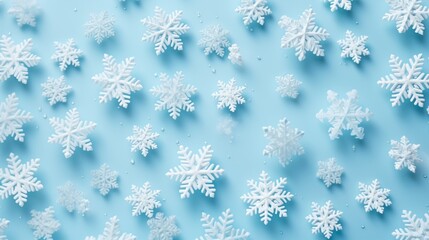 white snowflakes on light blue background