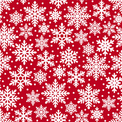 Snowflakes. Christmas seamless pattern with snowflakes. White snowflakes on a red background. Winter background.