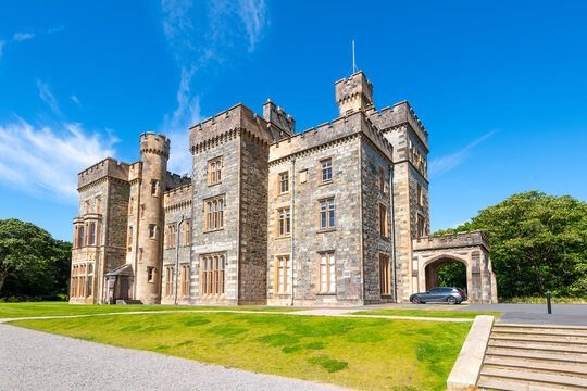 The historic Lews Castle looks out over the harbor port of the village of Stornoway, Scotland, on Lewis and Harris Island in the Outer Hebrides.