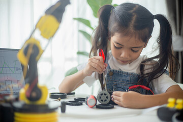 STEM education concept. Asian young girl learning robot design. - obrazy, fototapety, plakaty