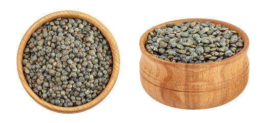 raw french green lentils in wooden bowl isolated on white background. Top view. Flat lay