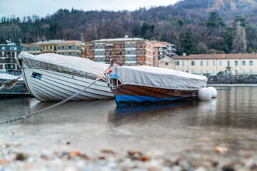 Fototapeta premium Small fishing boats with fishing net and equipment, motor boat or sail boat floating in the lake