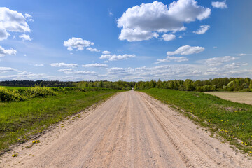 unpaved road in rural areas in spring, unpaved road