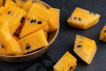 ripe orange watermelon with black pits watermelon close-up