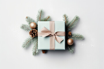 Fototapeta na wymiar Gift box with Christmas ornaments on white background top view