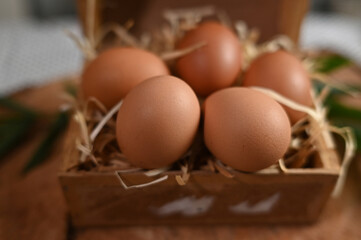 natural chicken egg on wooden table, rustic free range chicken natural farm food yolk and white of bird animal