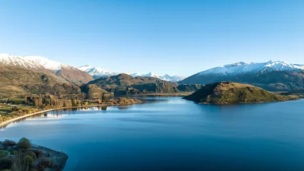 Cercles muraux Plage de Camps Bay, Le Cap, Afrique du Sud Dawn scenery at Glendhu bay campground  looking across Lake Wanaka towards the snow capped mountains in Mt Aspiring National Park