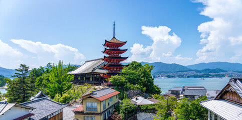 Miyajima island city view with Five-storied Pagoda in the precincts of itsukushima shrine at...