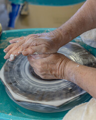 hands of a potter at work