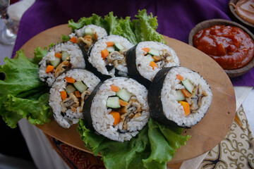 Lemang, a traditional Indonesian food, is made from sticky rice wrapped in banana leaves mixed with chicken meat.