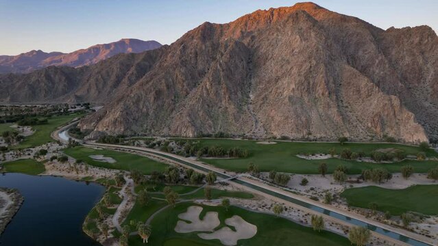 Aerial Timelapse of sunrise illuminating the mountains in La Quinta 