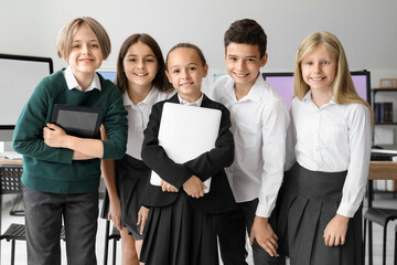 Fototapeta premium Little children at school computer lab