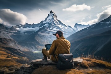 Fototapeta premium Digital nomad working on a laptop with a breathtaking mountain view created with Generative AI