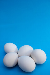 Vertical blue background white eggs cooking wallpaper
