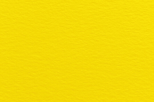 Yellow paper texture background. Golden backdrop. Rough and grunge surface backdrop. 