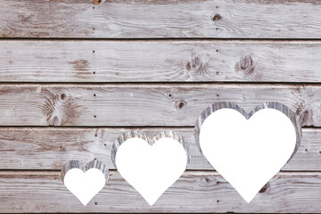 Digital png illustration of wooden planks with cutting hearts on transparent background