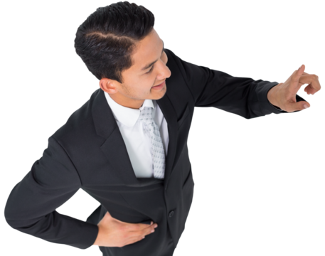 Digital png photo of happy biracial businessman pointing on transparent background