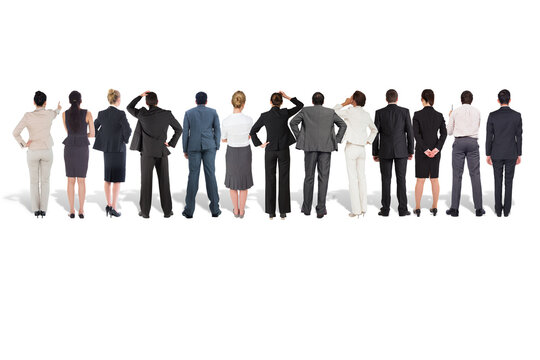 Digital png photo of back of diverse group of business people standing on transparent background