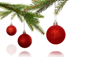 Obraz na płótnie Canvas Digital png illustration of red christmas balls on branches on transparent background