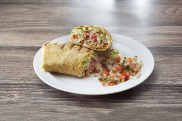 A view of a grilled chicken wrap.