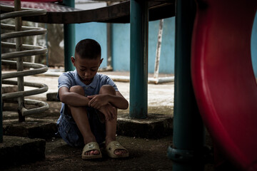 Crying boy student making a stop gesture to plead for an end to child violence stop violating...
