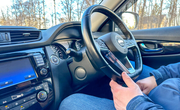 the driver in the wrong position at the wheel of the car